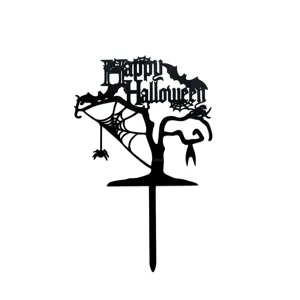 Black acrylic Halloween cake topper detail featuring spooky tree and spider web design.