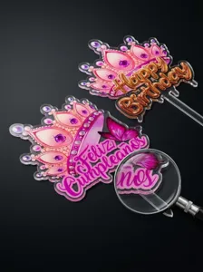 3D printed acrylic happy birthday cake topper with crown and butterfly design detail shot.