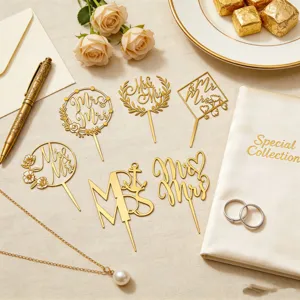 Gold acrylic Mr & Mrs wedding cake toppers set, perfect for bridal showers and engagement parties.