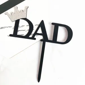 Acrylic DAD cake topper detail shot with silver glitter crown for Father's Day party decor.
