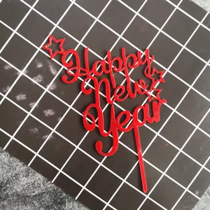 Red acrylic Happy New Year cake topper with stars, perfect for New Year party dessert decor.