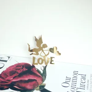 Gold mirror acrylic Cupid love cake topper for Valentine's Day wedding party dessert decor.