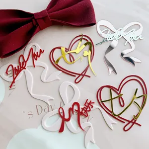 Acrylic Valentine's Day cake toppers with cute heart and bow designs for romantic party decor.