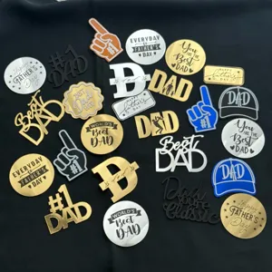 Father's day acrylic cake topper detail shot, gold and silver best dad cupcake inserts.