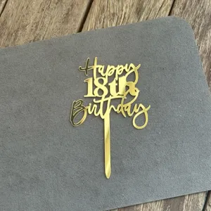 Gold acrylic 18th birthday cake topper sparkling party decoration fine detail shot display.