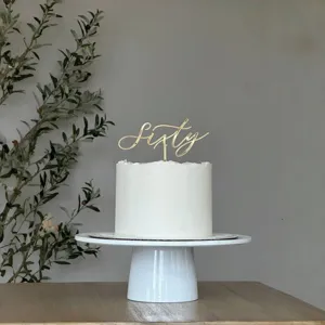 Gold acrylic Sixty cake topper for birthday party anniversary celebration cake decoration.