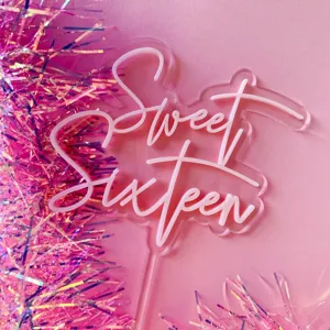Acrylic Sweet Sixteen cake topper detail, pink birthday party cake decoration insert.