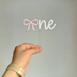 Acrylic one cake topper with pink bow for baby first birthday party cake decoration dessert.