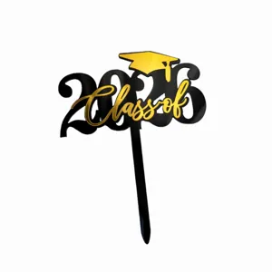 Acrylic 2026 graduation cake topper detail closeup, black and gold design for party decor.