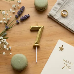 Gold geometric number candle for birthday cake party decoration, stylish diamond design.