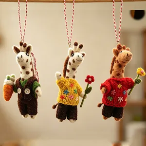 Handmade wool felt giraffe hanging ornament detail featuring cute design and fine stitching.