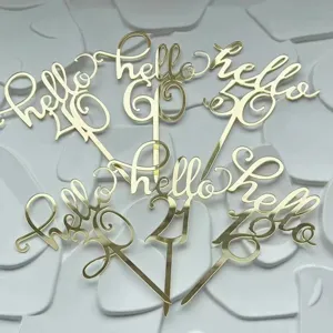 Gold acrylic hello number cake toppers for birthday party dessert table decorations.