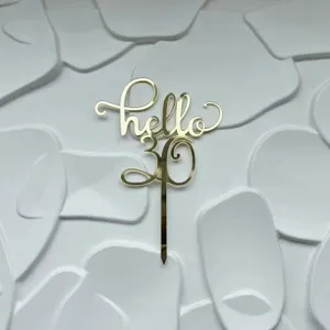 Gold acrylic Hello 30 cake topper detail shot, perfect for birthday party celebration decor.