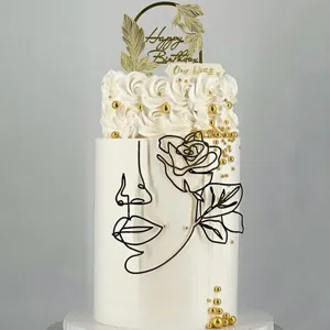 Acrylic face line art cake topper set with rose design for birthday party decoration.