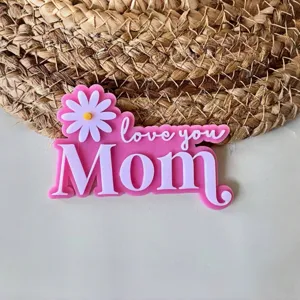 Double layer acrylic daisy love you mom cake topper detail view, baking party decoration.