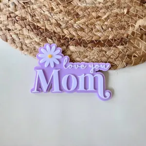 Mother's Day acrylic cake topper with cute daisy flower and love you Mom text design.