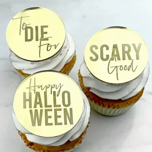 Details of the round gold mirror acrylic Halloween cupcake topper set for party decor.