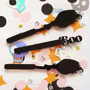 Halloween black acrylic hair clips set featuring broom and BOO spooky designs for party.
