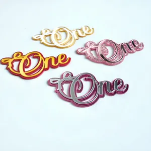Acrylic one cake topper with bow, perfect for baby first birthday party detail.