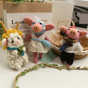 Handmade wool felt cute animal hanging pendant keychain bag charm accessory detail display.