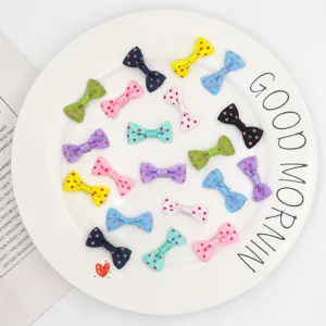 Mini 3cm polka dot grosgrain ribbon bows, cute hair clips and pet accessories detail.