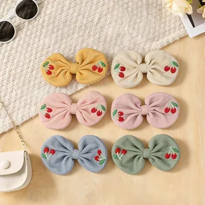 Set of 6 cute linen bow hair clips featuring lovely cherry embroidery for daily styling.