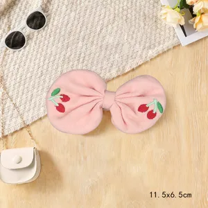 Pink fabric bow hair clip with cute embroidered cherry detail, perfect for daily sweet styling.