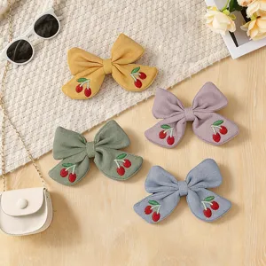 Cotton linen fabric bow hair clips with cute cherry embroidery for daily sweet girl hair styling.