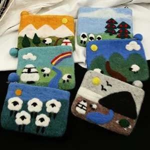 Handmade wool felt coin purse with cute sheep landscape patterns, perfect for cards.