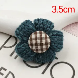Handmade knitted wool small flower accessory detail, 3.5cm crochet floral patch for crafts.