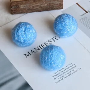 Handmade blue wool yarn decorative balls for Christmas tree, garland, and festive home decor.