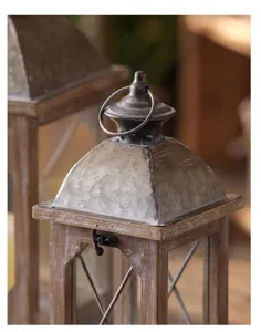 Rustic wooden candle lantern with galvanized metal roof and vintage distressed finish for home decor.