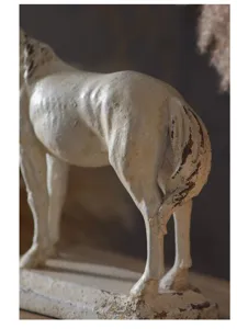Vintage wabi-sabi style resin horse figurine, artistic close-up view for tea room decor.