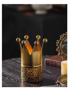 Exquisite European vintage crown candle holder with intricate hollow carved patterns.
