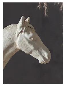 Close up detail of vintage resin horse head sculpture wabi sabi style tea room decor ornament