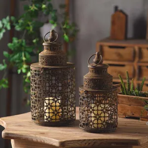 European retro distressed iron candle holder set, vintage hollow garden lantern for decor.