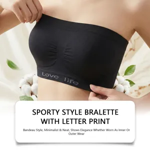 Black sporty strapless bandeau bralette with letter print, comfortable seamless design detail.
