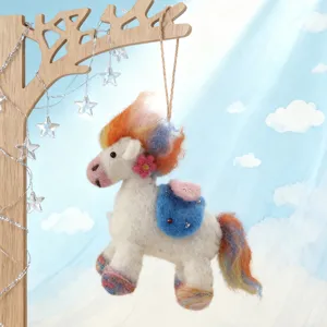 Handmade felt pony plush toy detail showing colorful mane and cute blue bag ornament.