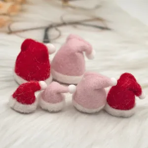 Miniature wool felt Santa hats, perfect DIY Christmas tree ornaments and holiday accessories.