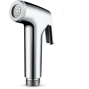 Bidet sprayer nozzle detail view, chrome plated toilet attachment for bathroom cleaning.