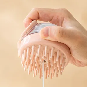 Spazzola per shampoo massaggio cuoio capelluto in silicone con dispenser di liquido per capelli.