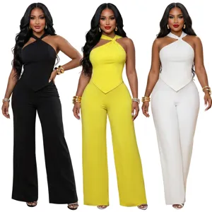 Elegant women's halter twisted crop top and wide leg pants two piece set for stylish commute.