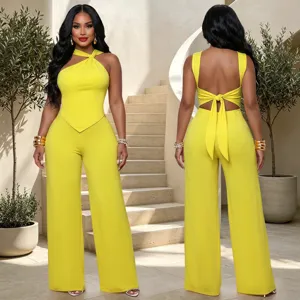 Women yellow halter neck twist crop top and high waist wide leg pants two piece set detail
