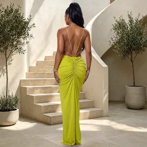 Backless spaghetti strap ruched evening party dress detail shot showcasing elegant green silhouette.