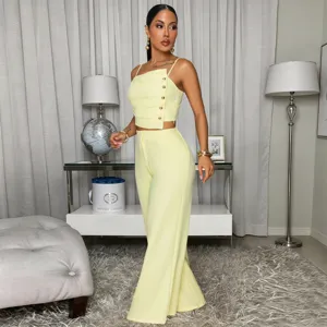 Solid pleated metal button camisole top and wide leg pants two-piece set for women.