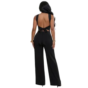 Detail view of the elegant black backless jumpsuit featuring a bow tie back and wide legs.