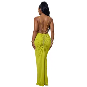 Back view of sexy halter backless ruched bodycon long evening dress in olive green color.