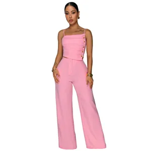Pink two-piece women's outfit with pleated camisole and wide-leg trousers for stylish wear.