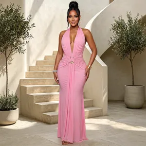 Elegant pink halter deep V-neck pleated fishtail evening dress detail showcase in luxury setting.