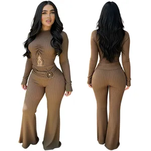 Detailed front and back view of the ribbed knit long sleeve cutout top and flared pants set.